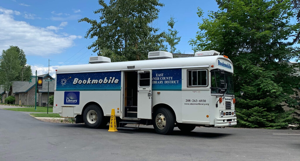 side view of the bookmobile with open sign